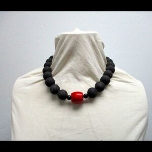 Lava stone and coral necklace